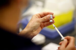 France rushes to get vaccinated after president’s warning