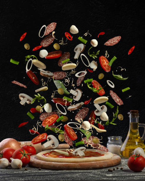 The Pizza Edition: Exploring Pizza's Origins, Evolution, and Global Appeal 2 A scrumptious 12 inch pizza with a variety of toppings